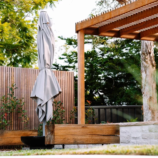 timber pergola and outdoor umbrella