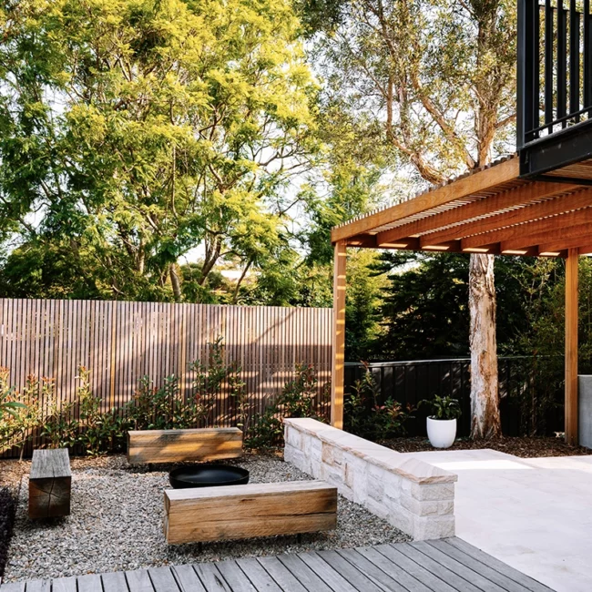Pergola with deck above outdoor seating area